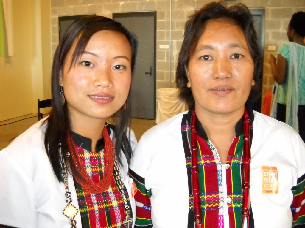 Two of our students wore traditional Burmese dresses for the fashion show. Here they are getting ready for the catwalk.